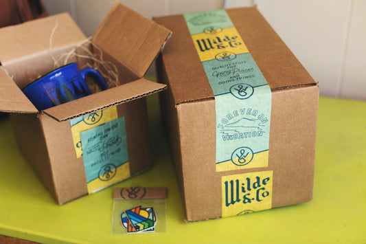 Cardboard boxes with eco tape example of environmentally friendly packaging materials.