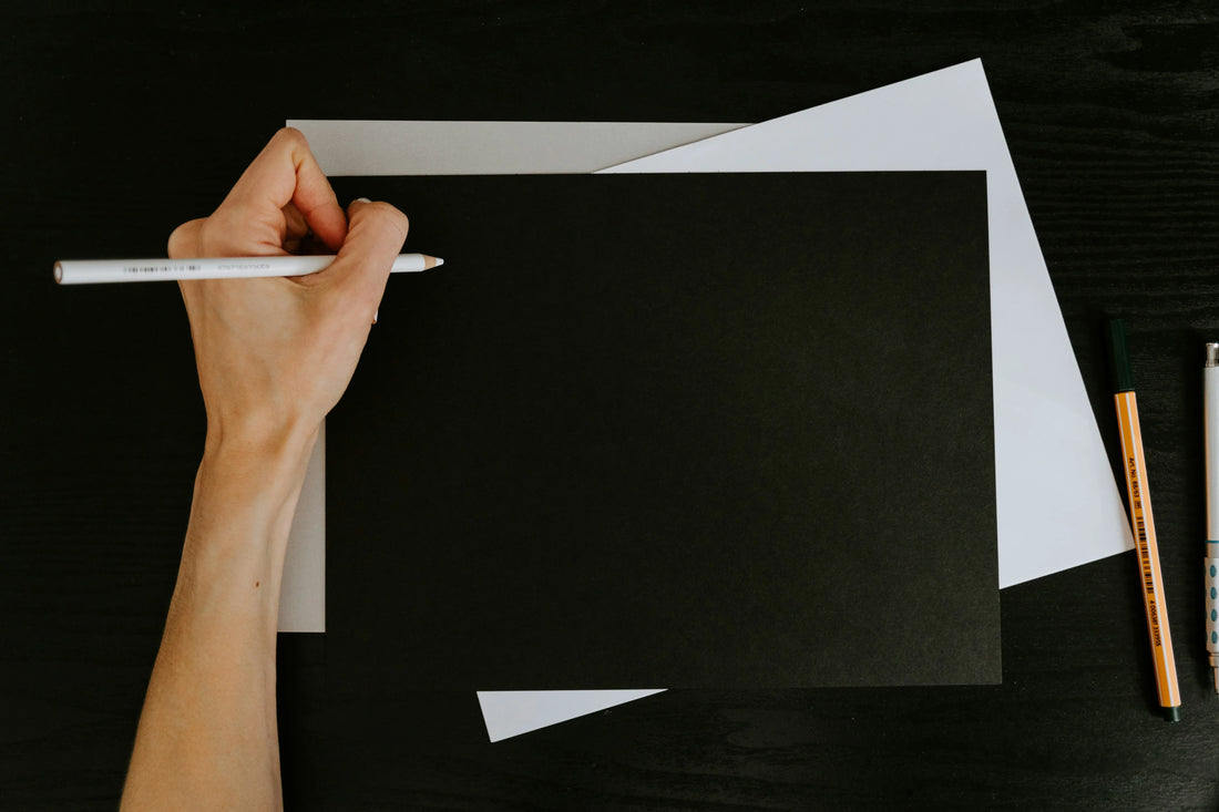 What is GSM paper weight example with black and white sheets