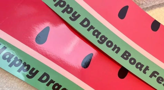 Gloss lamination vs matte lamination: a vivid, glossy laminated card with a watermelon design.