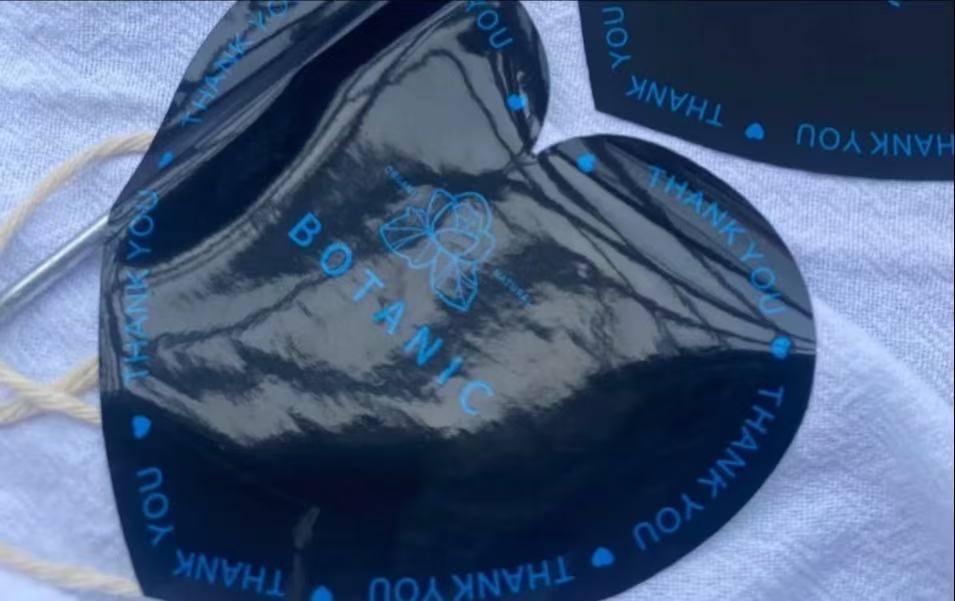 How to use laminating film: a heart-shaped, glossy laminated "Thank You" tag