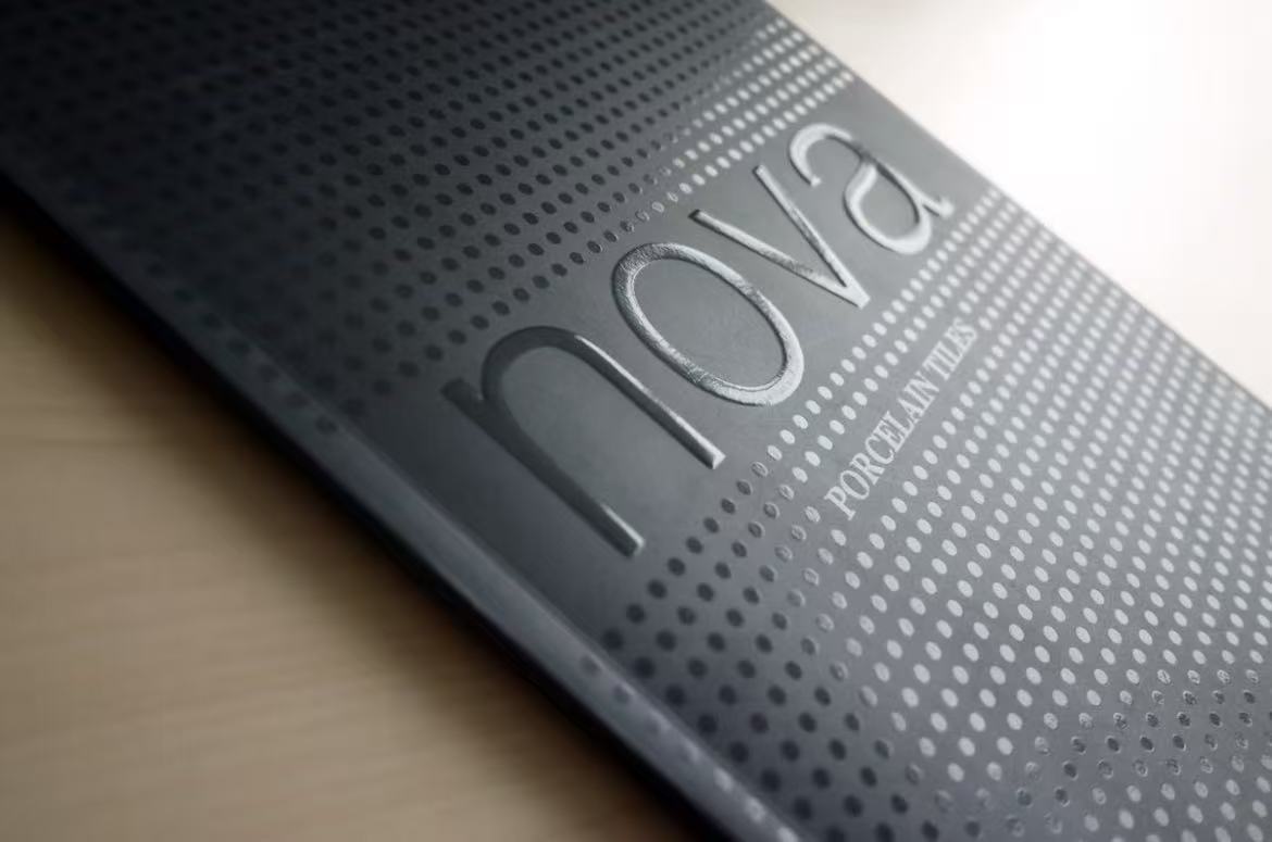 What is UV printing: a close-up of a printed cover with glossy spot UV coating.