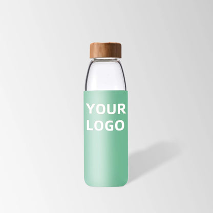 25 oz. Glass Water Bottle with Bamboo Lid and Light Green Silicone Sleeve