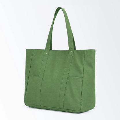 Custom canvas tote bag with dual front pockets in green