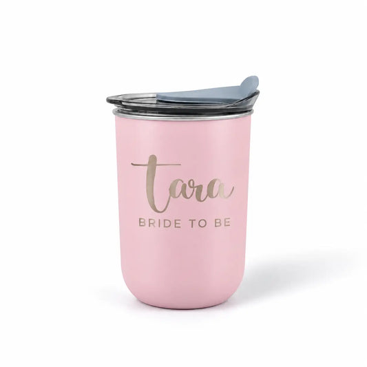 Pink custom tumbler engraved with Tara and Bride To Be text